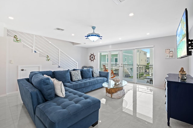 94825 Overseas Hwy Unit 185, Key Largo, FL 33037 - living room with stairs, light tile patterned floors, and recessed lighting