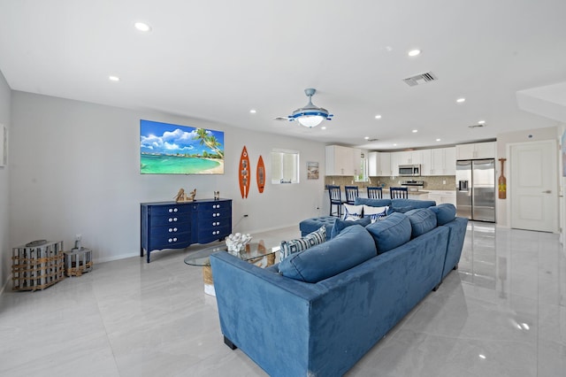 94825 Overseas Hwy Unit 185, Key Largo, FL 33037 - living area with recessed lighting and light tile patterned floors