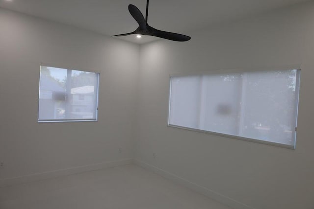 empty room featuring ceiling fan