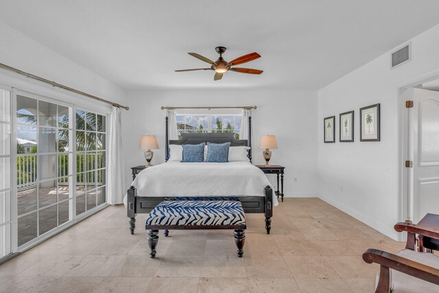 bedroom with ceiling fan and access to exterior