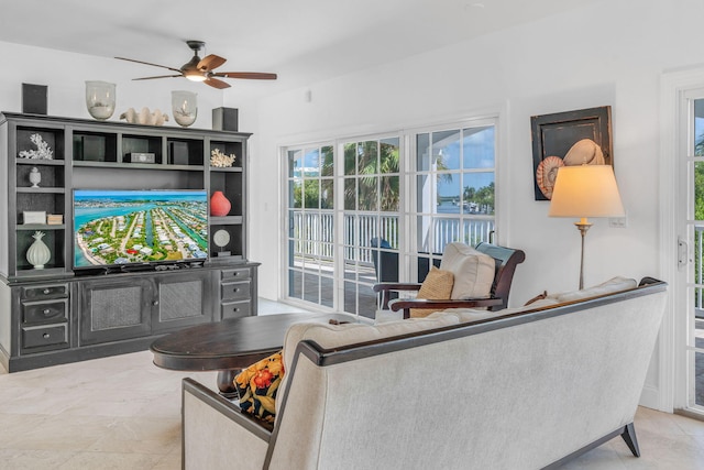 living room featuring ceiling fan