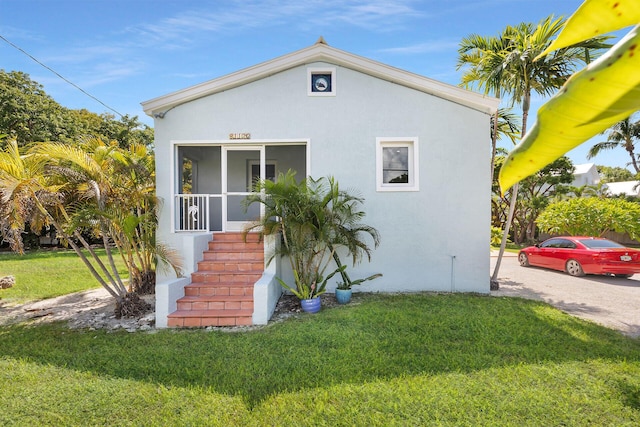 exterior space featuring a front yard