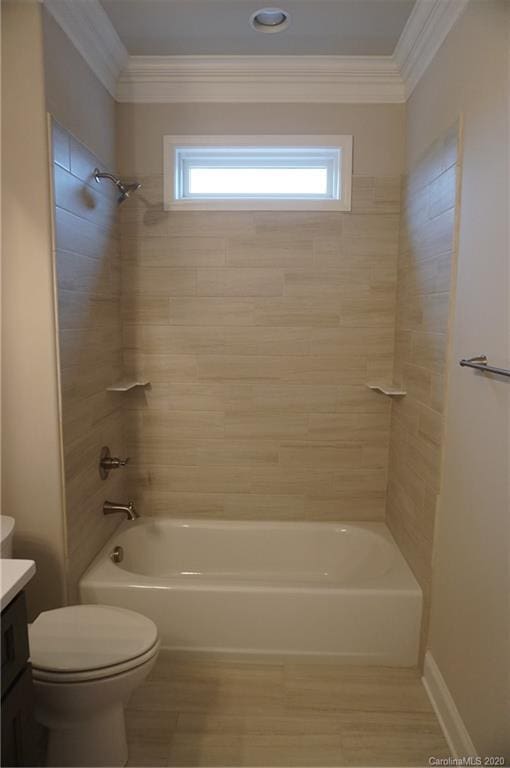 full bathroom with crown molding, toilet, a healthy amount of sunlight, and vanity