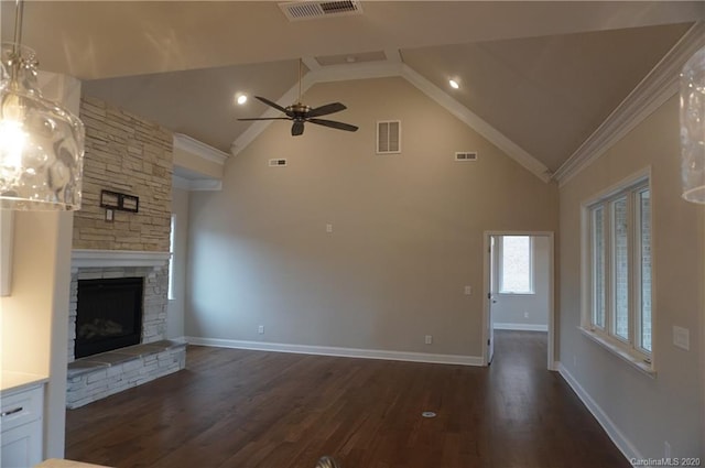 unfurnished living room featuring ceiling fan, a fireplace, high vaulted ceiling, crown molding, and dark hardwood / wood-style floors