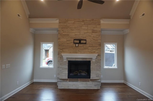 unfurnished living room featuring ceiling fan, dark hardwood / wood-style floors, and crown molding