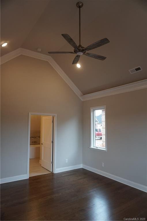 unfurnished room with ceiling fan, dark wood-type flooring, and ornamental molding