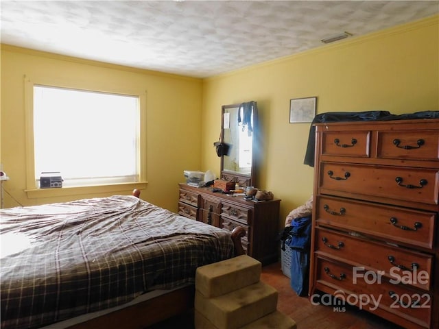 bedroom featuring hardwood / wood-style floors