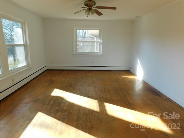 unfurnished room featuring dark hardwood / wood-style flooring and ceiling fan