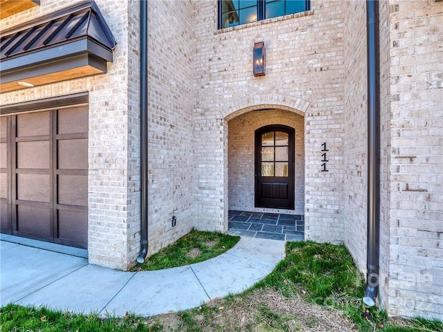 entrance to property with a garage