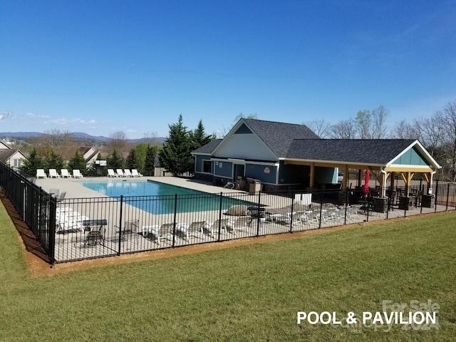 view of pool featuring a patio, a gazebo, and a lawn