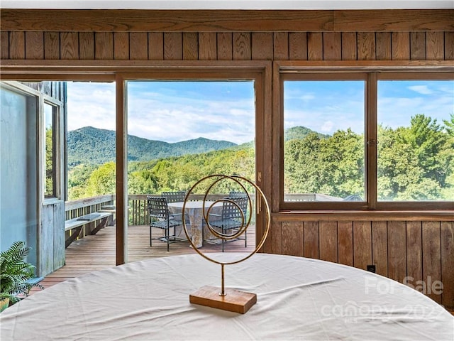 sunroom with a mountain view