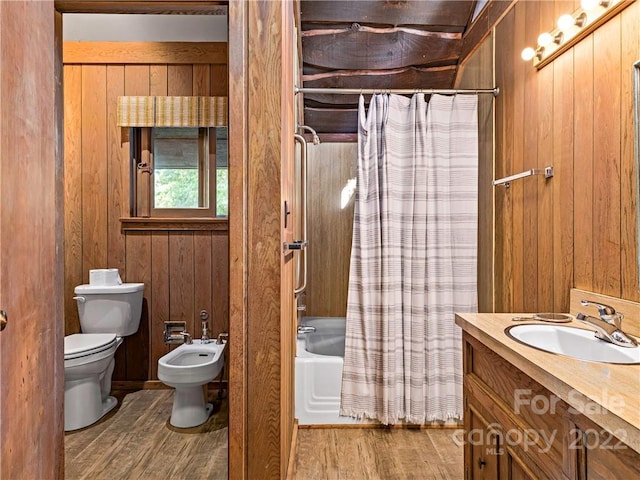 full bathroom with toilet, wood walls, a bidet, vanity, and shower / tub combo with curtain