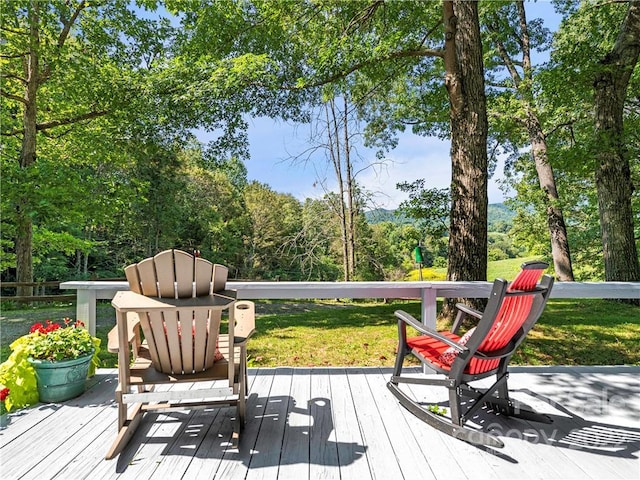 deck featuring a yard