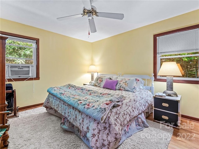 bedroom featuring ceiling fan and light wood-type flooring