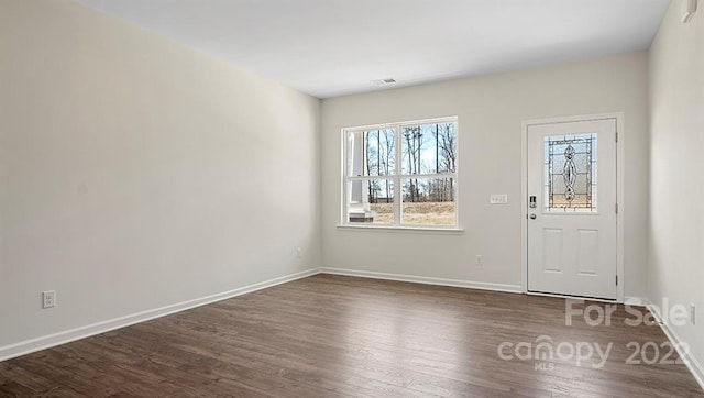 interior space with dark wood-type flooring