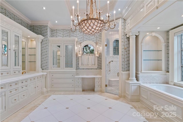 bathroom featuring decorative columns, vanity, separate shower and tub, tile patterned floors, and built in shelves