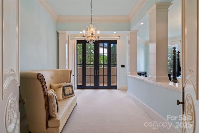 18019 Harbor Light Blvd, Cornelius, NC 28031 - carpeted entrance foyer featuring ornate columns, ornamental molding, a chandelier, french doors, and recessed lighting