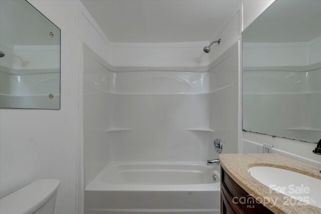 4 Morgan Cove Rd, Candler, NC 28715 - bathroom featuring washtub / shower combination, vanity, and toilet