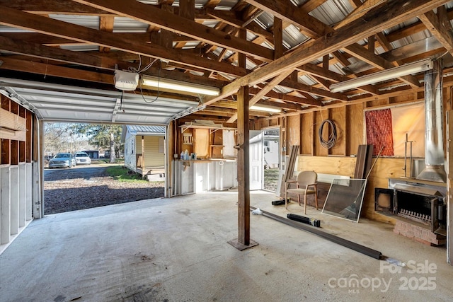 4 Morgan Cove Rd, Candler, NC 28715 - garage featuring a garage door opener