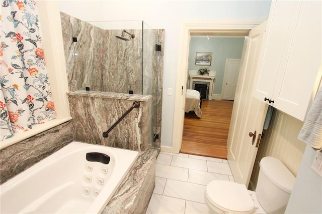 bathroom featuring tile flooring and toilet