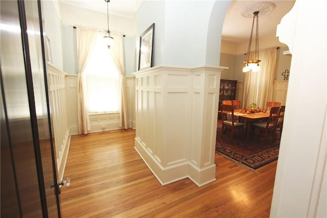 corridor with light wood-type flooring