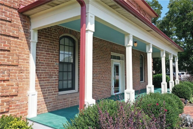 doorway to property with covered porch