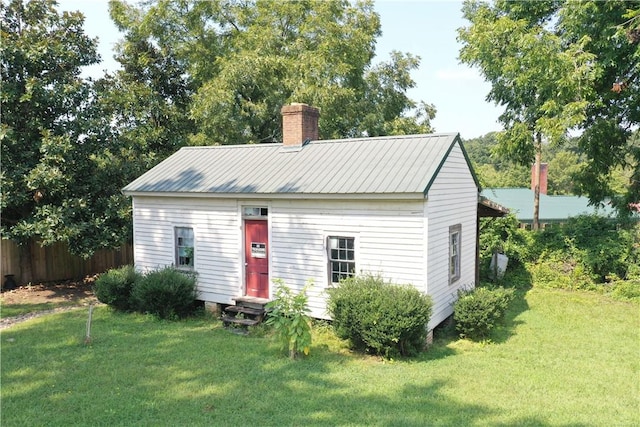 exterior space with a front yard