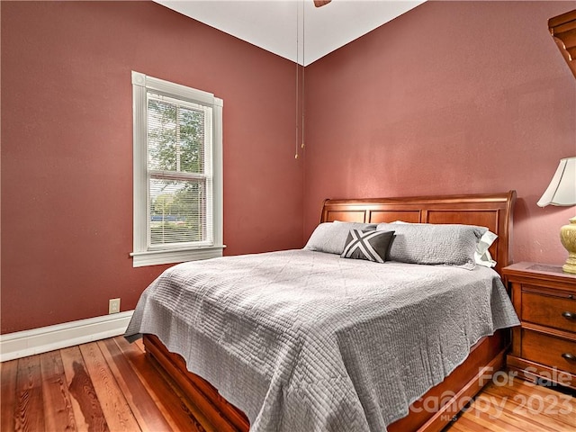 bedroom featuring ceiling fan and light wood-type flooring