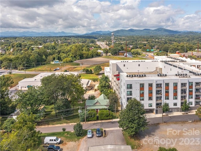 drone / aerial view featuring a mountain view