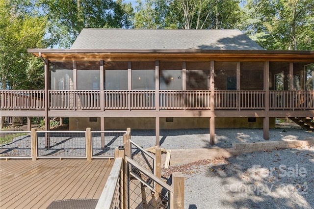 view of front facade featuring a wooden deck