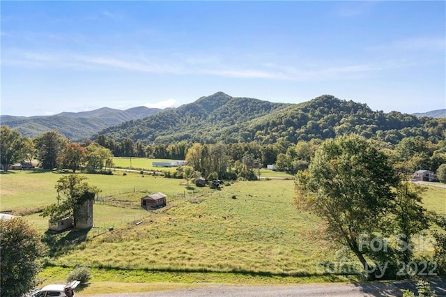 view of mountain feature featuring a rural view