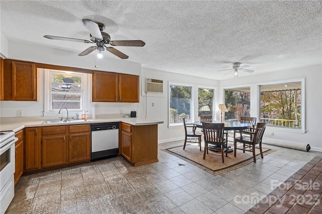 kitchen with white appliances, light tile floors, and a healthy amount of sunlight