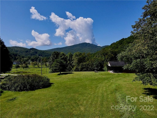 property view of mountains featuring a rural view