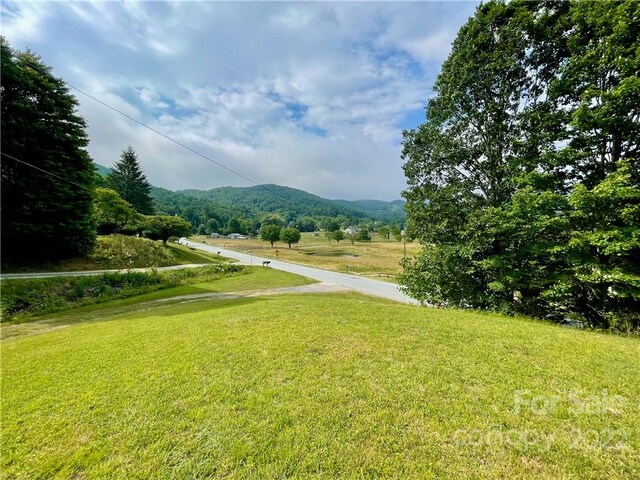 surrounding community featuring a lawn