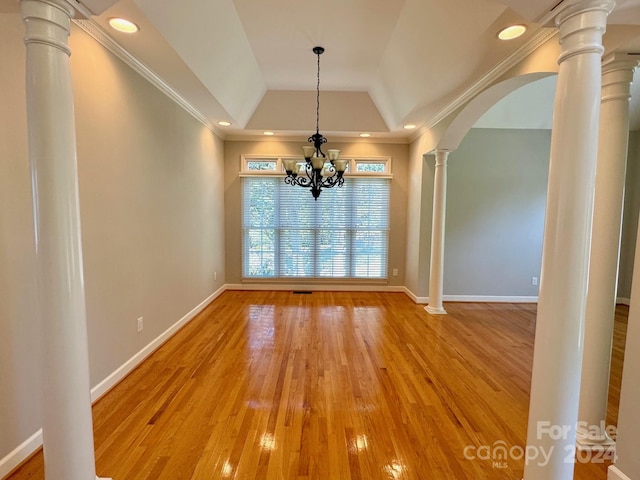 1563 Calls Lodge Ct, Morganton, NC 28655 - unfurnished dining area featuring a chandelier, ornamental molding, baseboards, and wood finished floors