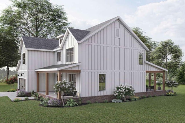 view of side of home with a lawn and a garage