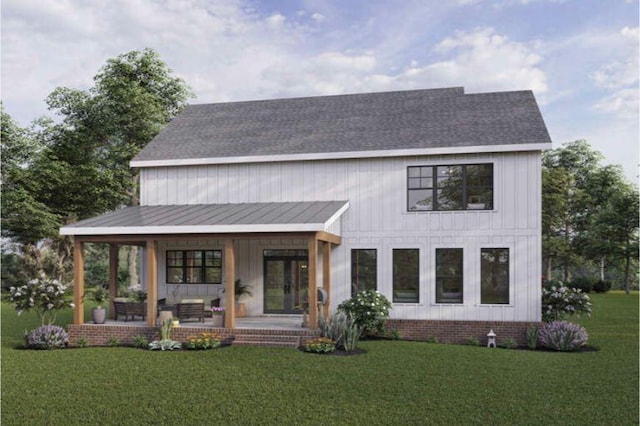 modern inspired farmhouse with a front lawn