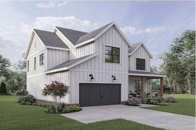 modern inspired farmhouse with a front yard and a garage