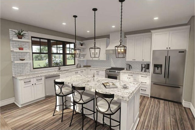 kitchen with a kitchen island, white cabinets, custom range hood, stainless steel appliances, and decorative light fixtures