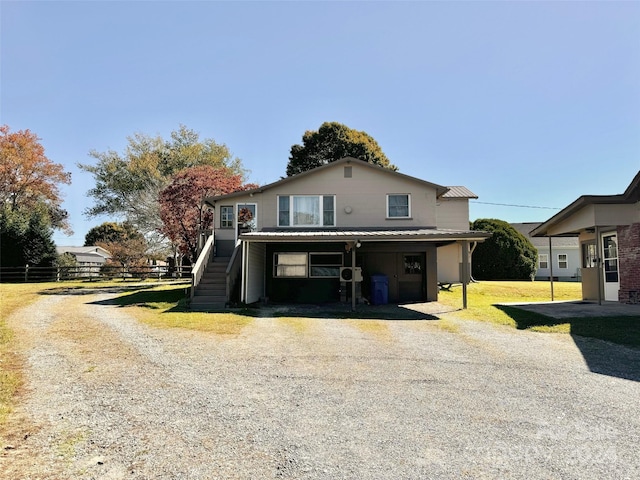 front of property with a carport