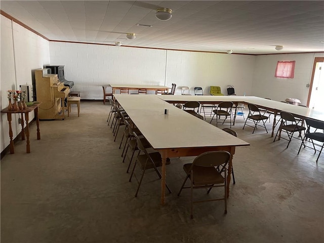 dining area with concrete floors