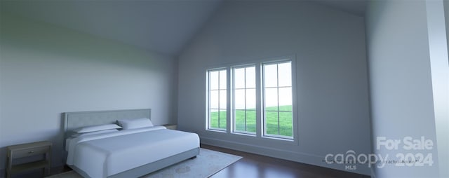 bedroom with vaulted ceiling