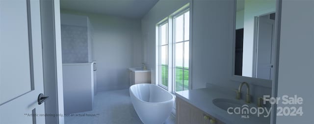 bathroom with vanity, tile flooring, and a healthy amount of sunlight