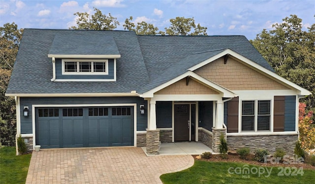 craftsman-style house featuring a garage