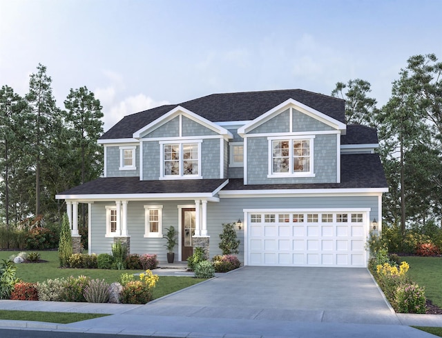 craftsman inspired home with a front lawn and a garage