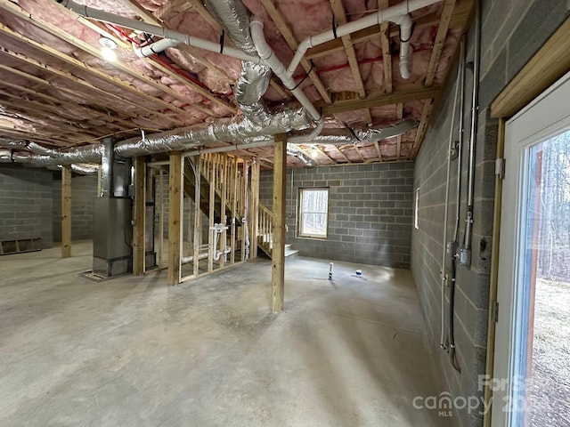 basement featuring heating utilities