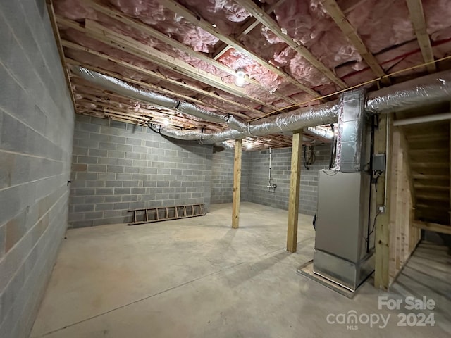 basement featuring heating utilities