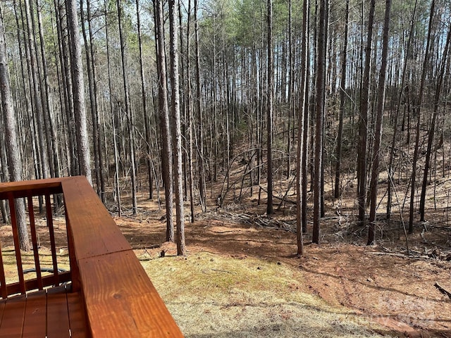 view of yard featuring a wooden deck