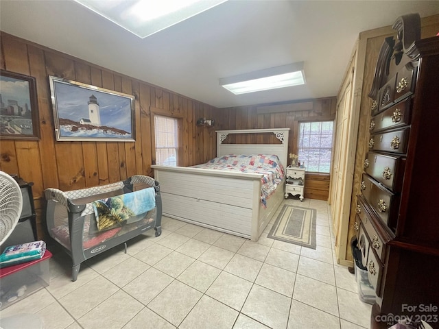 tiled bedroom with wooden walls