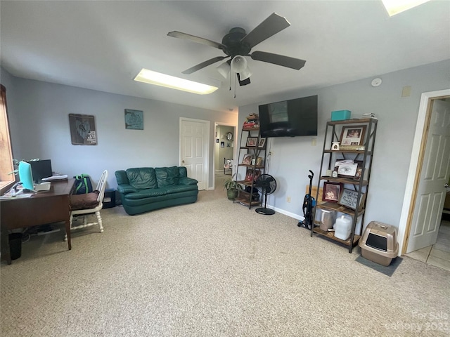 interior space featuring ceiling fan and light carpet